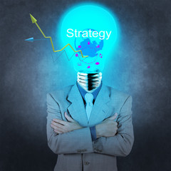 businessman with lamp-head as business strategy success concept