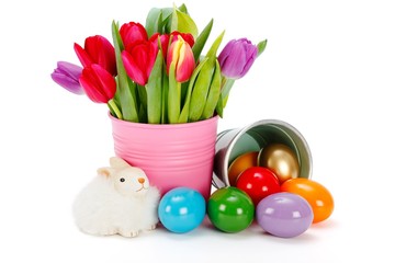 Easter symbols - painted eggs, tulips and toy rabbit