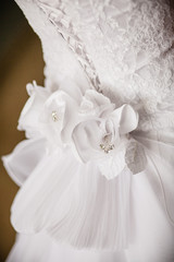 back of bride in wedding dress