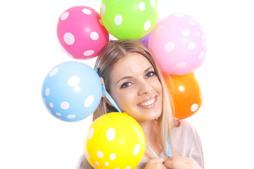 Fototapeta na wymiar beautiful girl with multicolored balloons