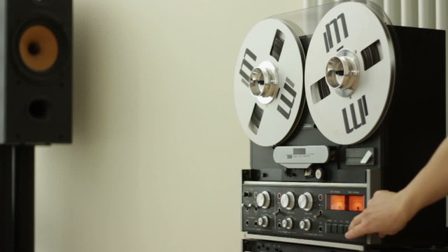 Vintage classic tape reel audio recorder, slow motion