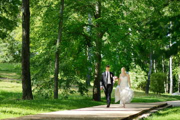 Fototapeta premium Beautiful bride and groom