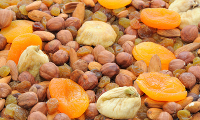Various dried fruits (apricots, dates, raisins, figs) close-up