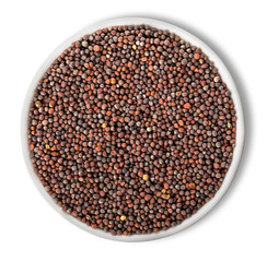 Black mustard seeds in plate isolated