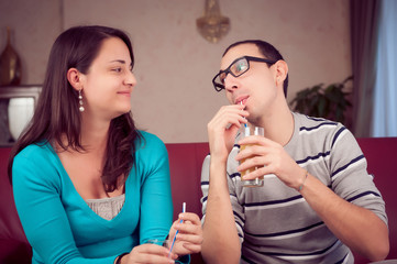 Romantic Young Couple Toasting and Drinking