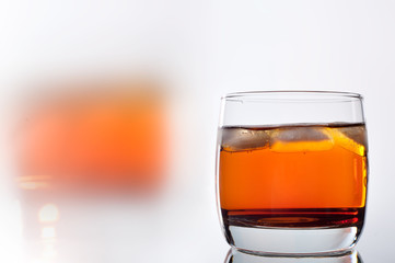 Glass of whiskey with ice