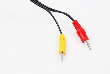 Red and yellow audio jacks on isolated white background