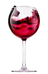 Glass with red wine splash