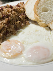 Nicaraguan style fried eggs breakfast with rice and bean gallo p