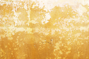 Yellow grunge cement wall background