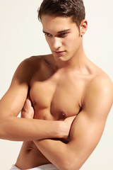 Strong handsome fitness sports man looking concentrated isolated