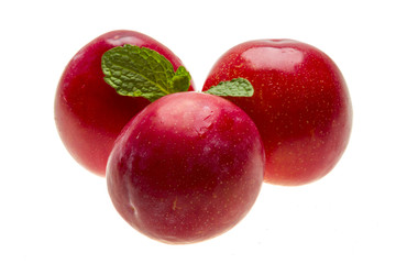 Bright ripe plum with mint