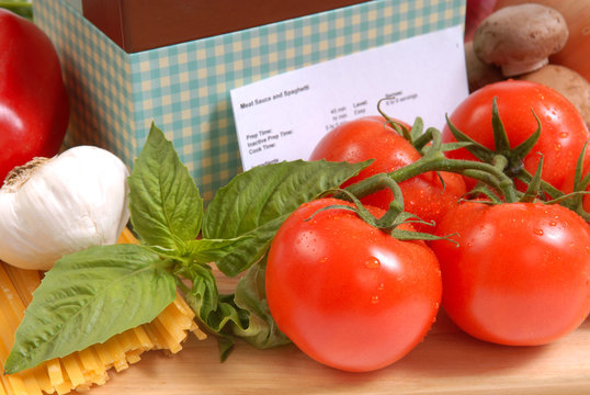 Recipe box with ingredients for spaghetti