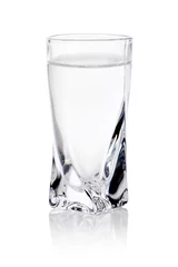 Crédence de cuisine en verre imprimé Alcool shot glass filled with clear cold alcohol
