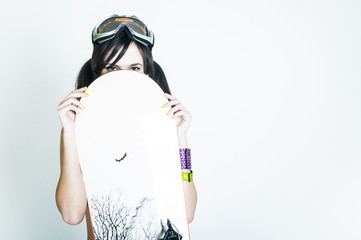 Young girl with snowboard