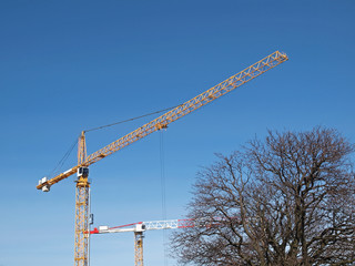 two industrial cranes
