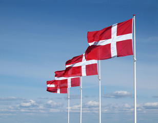 four flapping danish flags