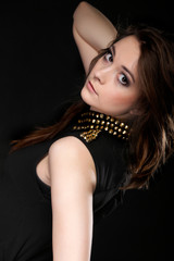 Fototapeta premium portrait of young woman party clothes studs collar