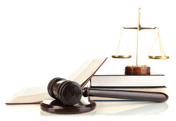 Golden scales of justice, gavel and books isolated on white