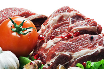 raw meat and fresh vegetables