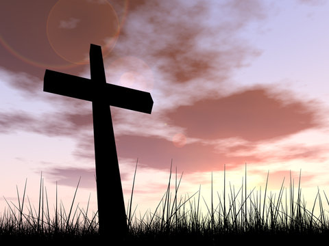 Conceptual religion cross over sunset