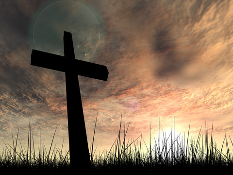 Conceptual religion cross over sunset