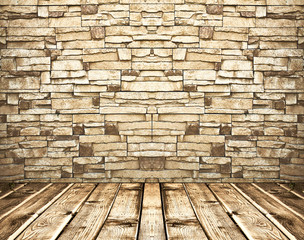 Empty old spacious room with stone grungy brick wall