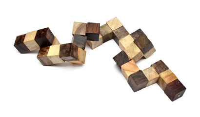 Puzzle in the form of wooden blocks on a white background
