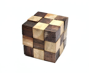 Puzzle in the form of wooden blocks on a white background