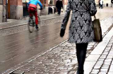 Woman on wet street