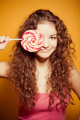 happy young woman with lollipop