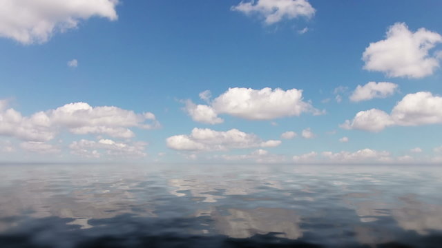 Clouds and calm ocean. Timelapse