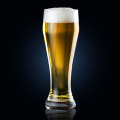 Glass of beer on black