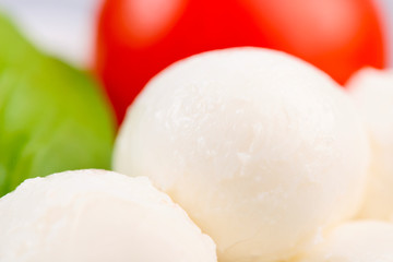 cherry tomato, mozzarella cheese and basil leaf