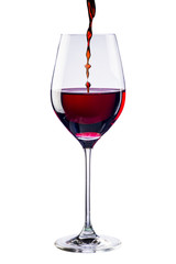 Wine pour into glass of red wine