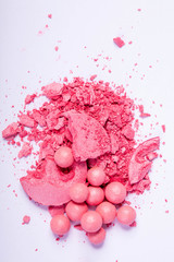 close up of a  make-up accessories -powder, eyeshadow,lipstick