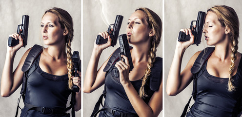 woman holding two hand gun