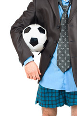 Businessman in his underwear with soccer ball