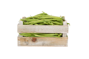 Fresh green beans in a wooden crate