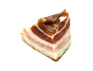 Slice of bacon on white background close up