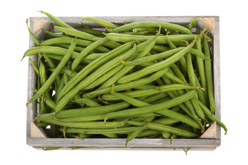 wooden crate with Fresh green beans viewed from above