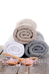 Towels and salt on a white background, spa items