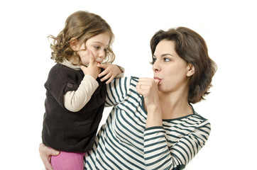 Mother and daughter sucking thumb