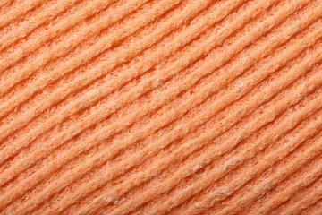 Orange sponge foam as background texture