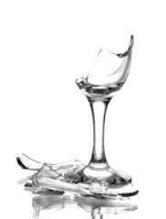 Broken wineglass isolated on white