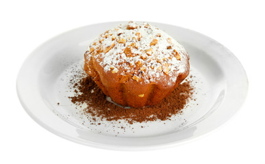 Fototapeta na wymiar Tasty muffin cake with powdered sugar and cocoa