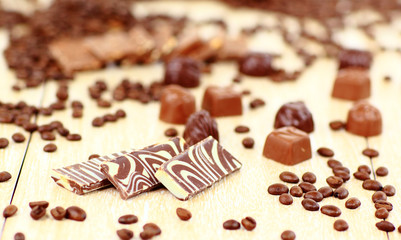 sweet chocolate candies and coffee beans