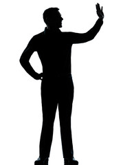 one business man saluting silhouette