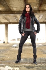Portrait of the city girl in black a leather to a jacket