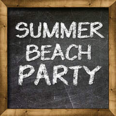 Fototapeta premium Summer beach party handwritten with white chalk on a blackboard.